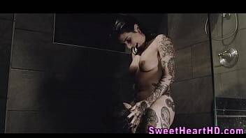 Inked les milf eaten out in the shower on pornmilftube.net